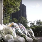 Hong Kong in mourning after deadly fire claims at least 128 lives