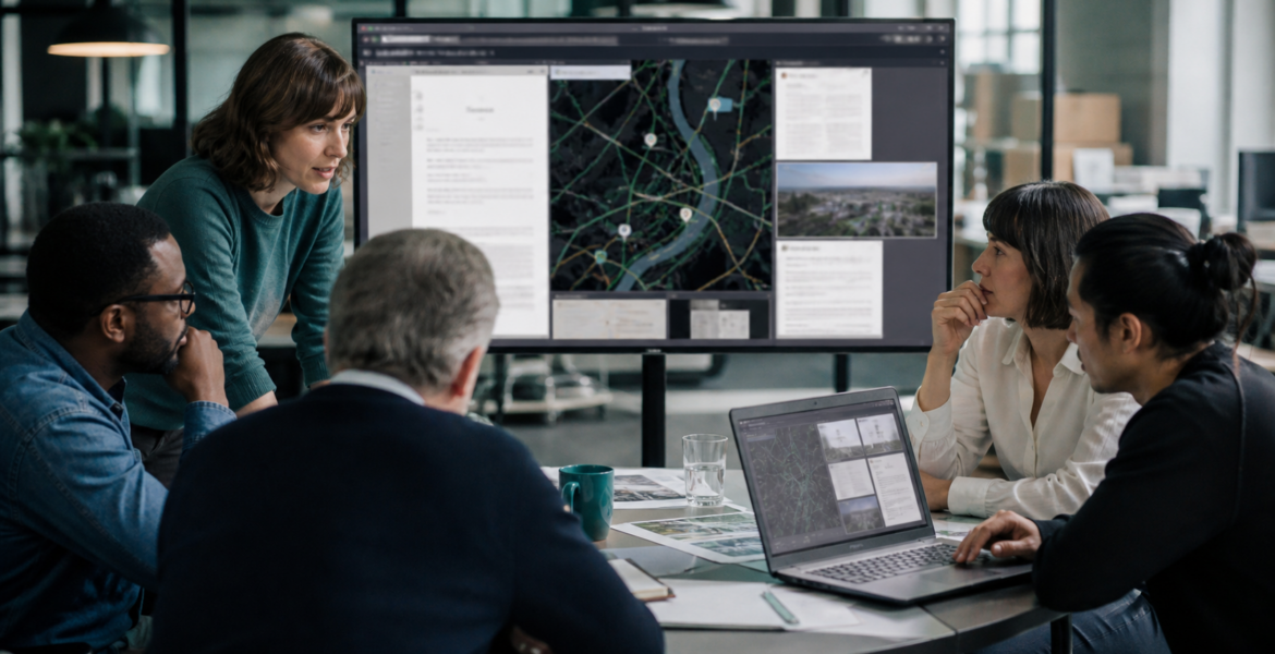 Journalists collaborating in a secure modern newsroom